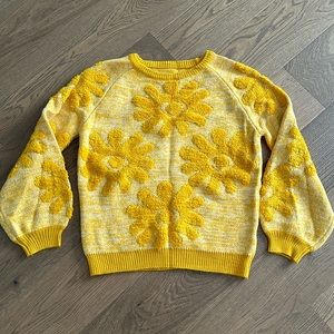 Golden yellow sweater with flower detail